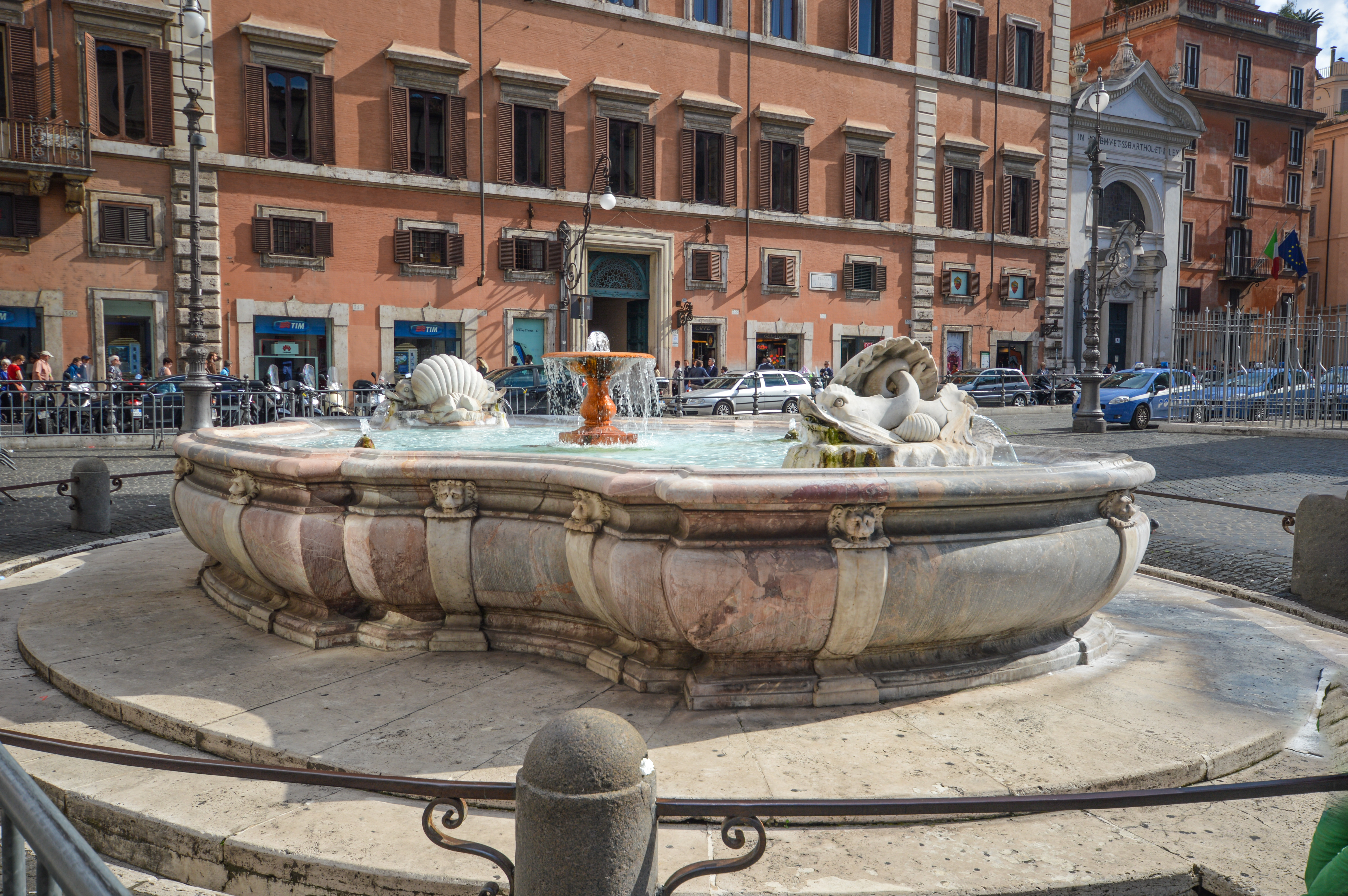 fountain in a bustling urban square