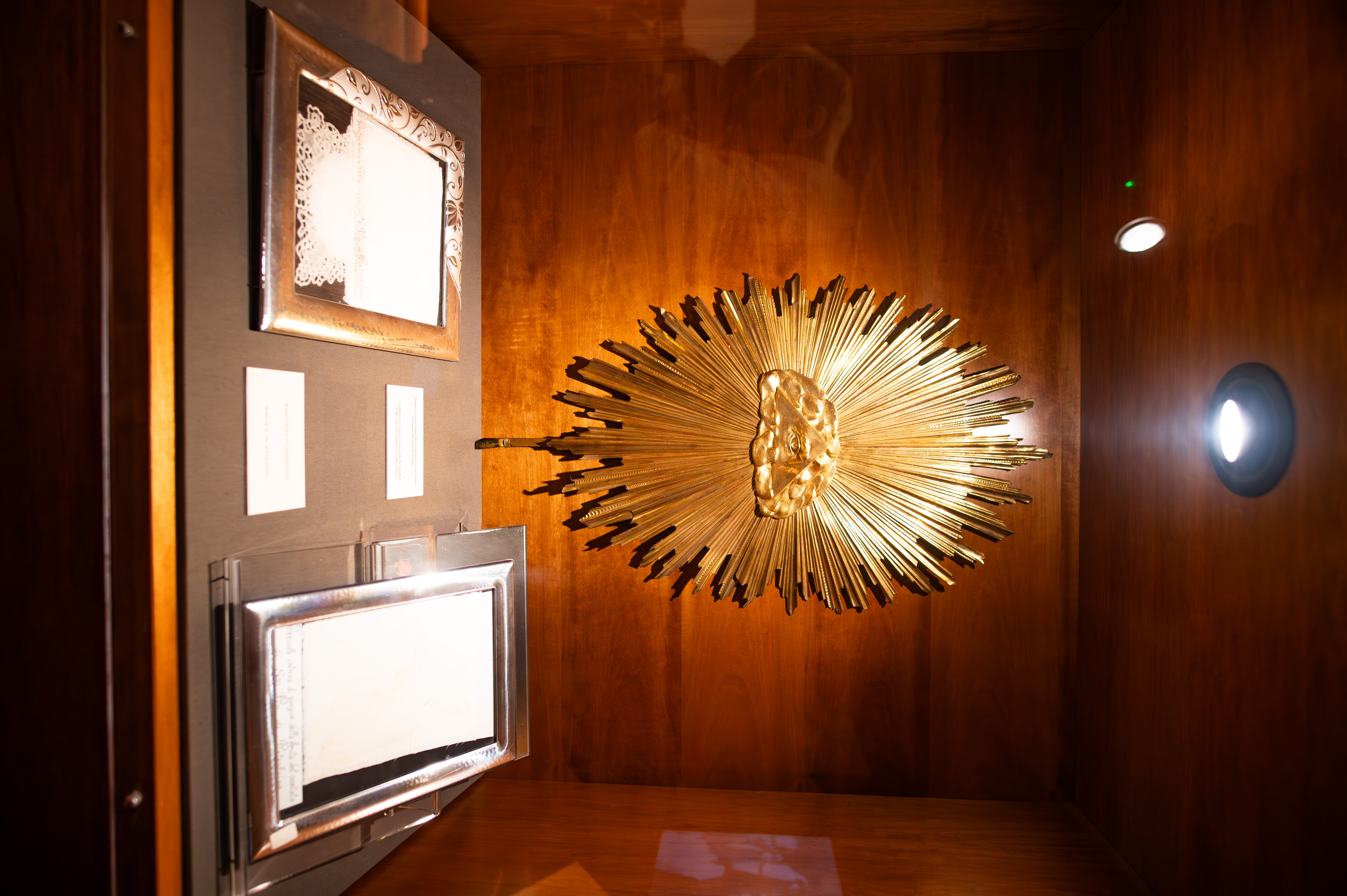 golden sculpture resembling a sunburst
