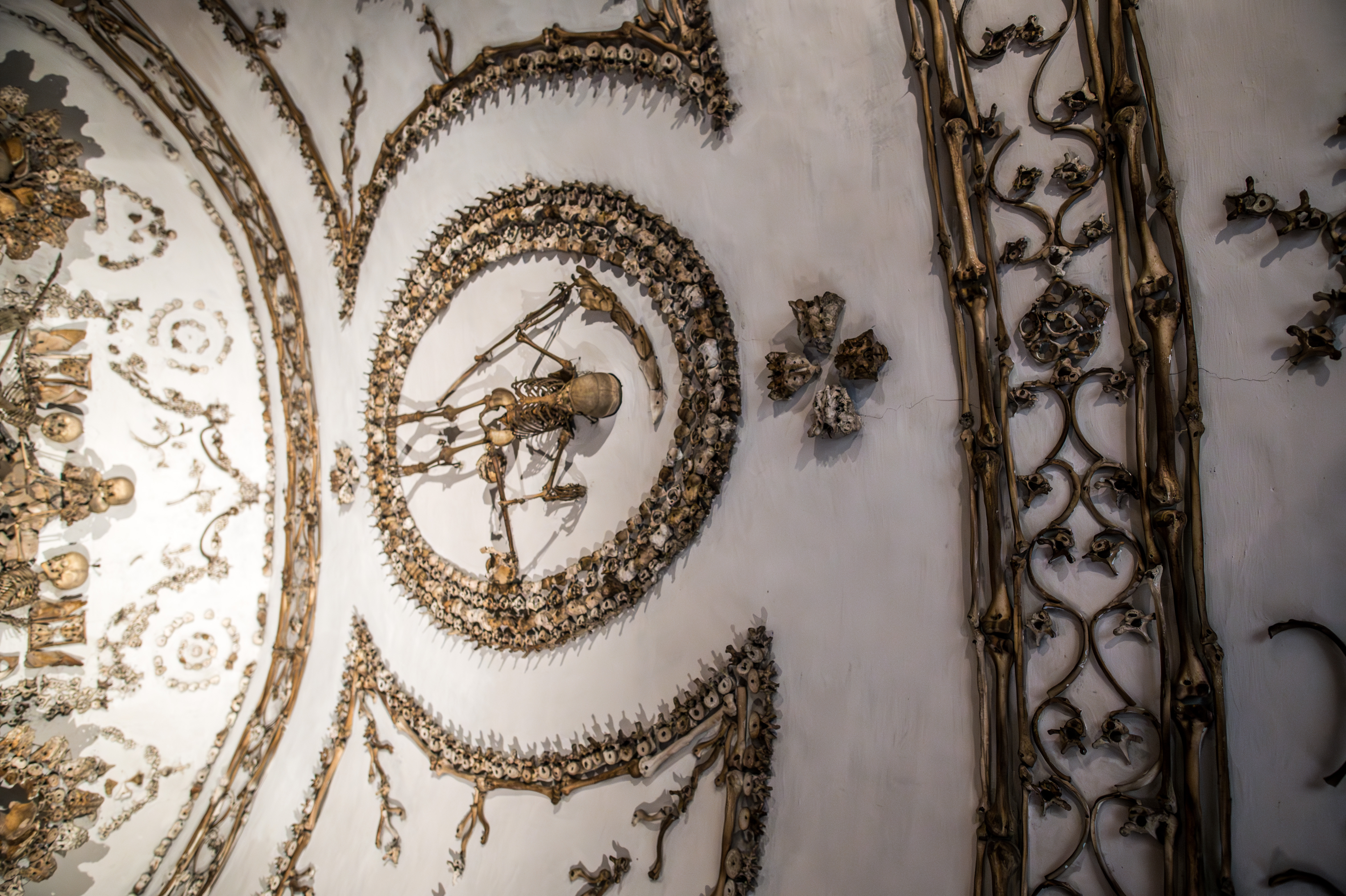 intricate and elaborate arrangement of human bones and skulls
