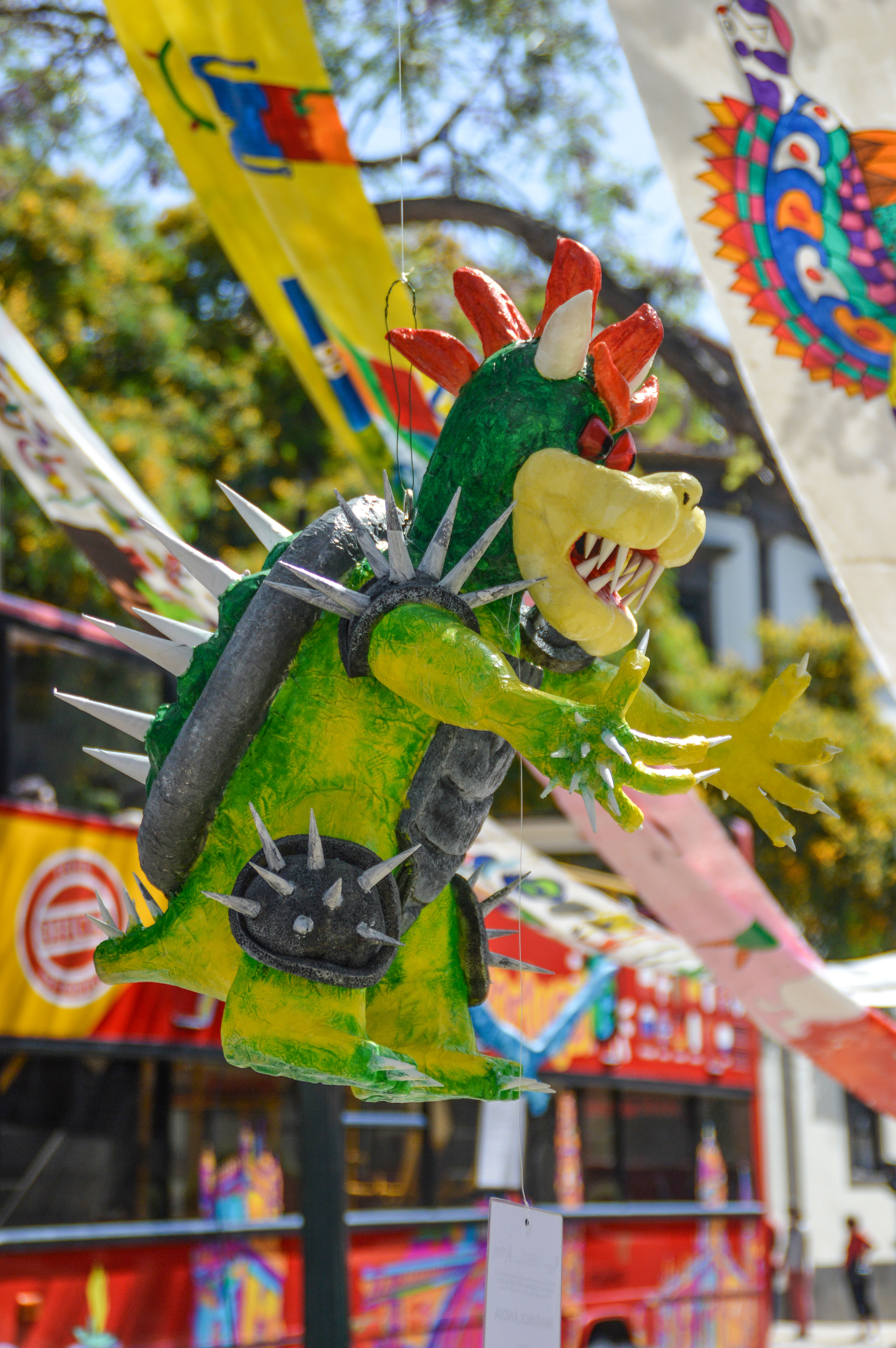 dragon-like figure crafted from paper mache