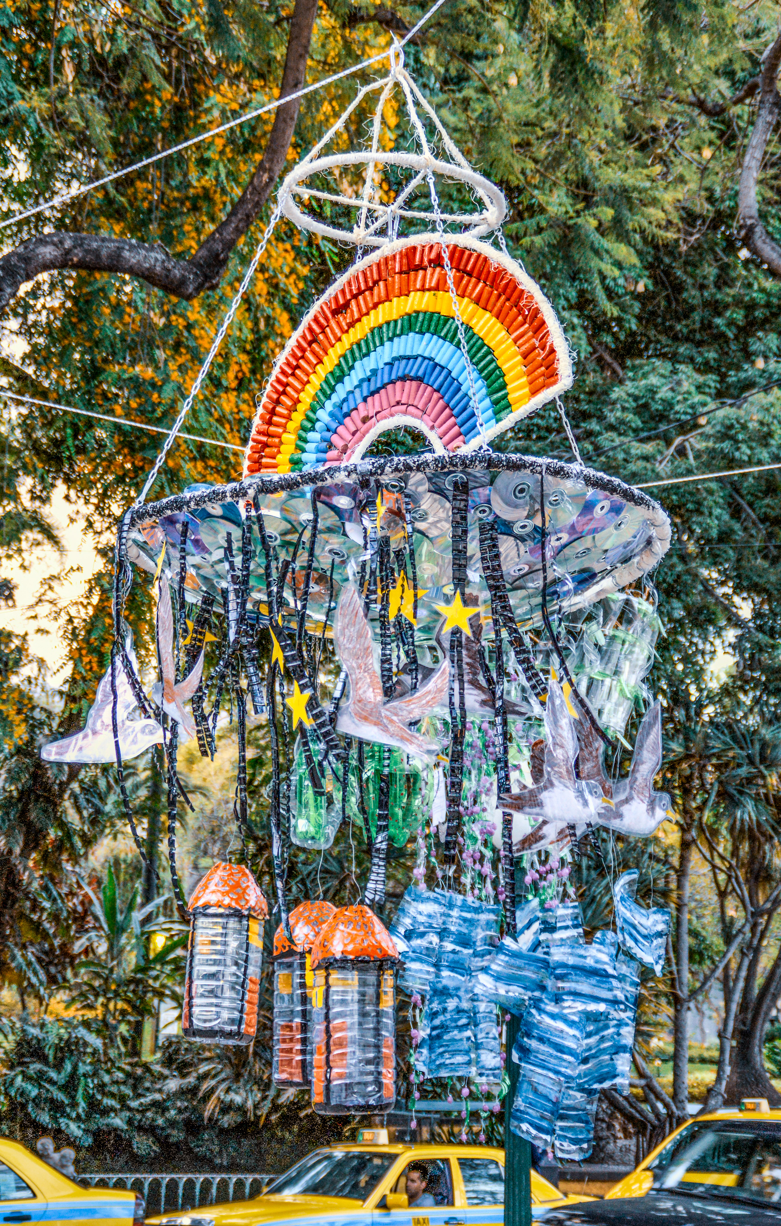 mobile hanging from a tree