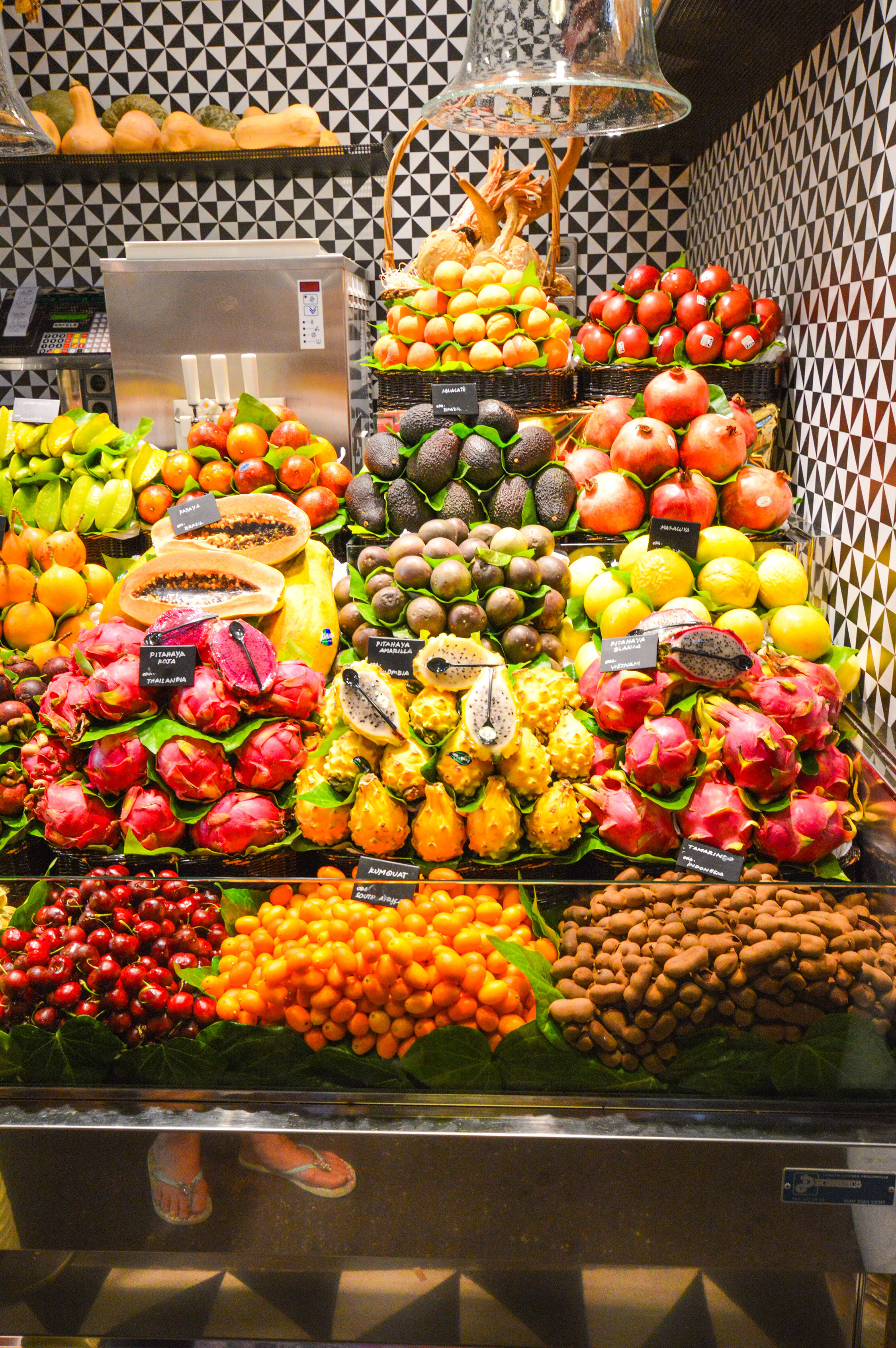 a vibrant and diverse display of exotic fruits in a market setting